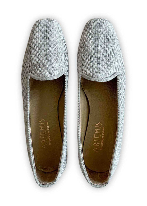 The Artemis Design Co Women's Loafers in grey offer timeless sophistication and versatility. Crafted with meticulous attention to detail, these loafers combine elegance with comfort, making them perfect for any occasion. The subtle grey hue adds a touch of understated refinement to your outfit, while the classic design ensures enduring style. (Front View)