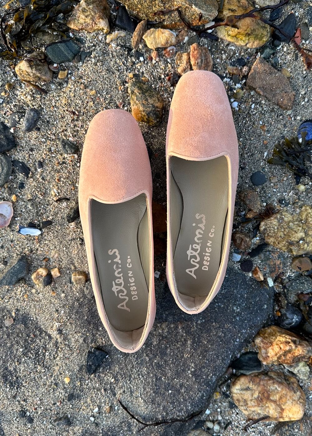 Artemis Design & Co's Women's Suede Loafers in pink are the perfect combination of style and comfort. Crafted with premium suede materials, these loafers feature a sleek design with attention to detail (Front View)