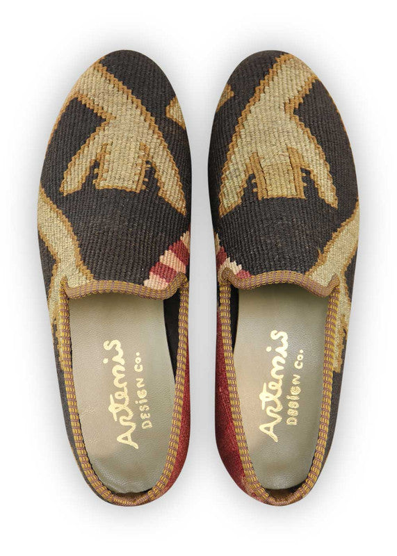 Artemis Design Co. Men's Loafers boast a sleek and sophisticated design, blending a classic color combination of black, khaki, brown, peach, and red. Expertly crafted with attention to detail, these loafers offer a perfect balance of style and comfort. Whether paired with formal attire or casual wear, they add a touch of refinement to any ensemble. (Front View)