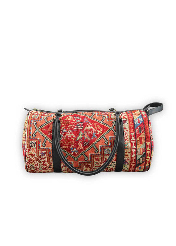 The Artemis Design & Co Travel Duffle Bag is a vibrant travel essential, boasting a lively color combination of red, white, blue, cream, orange, green, and maroon. Meticulously crafted, this duffle bag seamlessly blends patriotic and earthy tones, creating a dynamic and stylish companion for your journeys. The interplay of colors, from the patriotic red, white, and blue to the warm cream, energetic orange, lush green, and rich maroon, adds a playful and modern flair. (Front View)