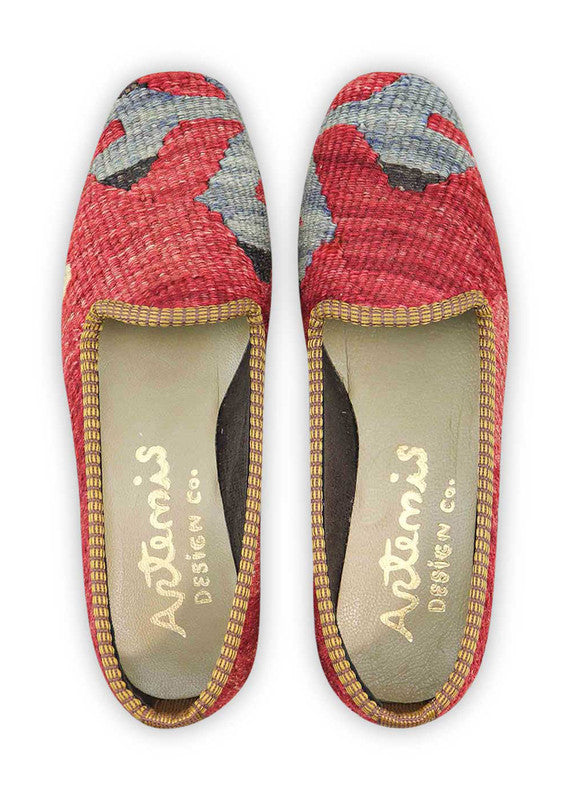 Artemis Design & Co Women's Loafers embody timeless chic with a classic color palette of red, blue, black, and white. Meticulously crafted, these loafers seamlessly blend bold and neutral tones, creating a versatile and stylish footwear option. (Front View)