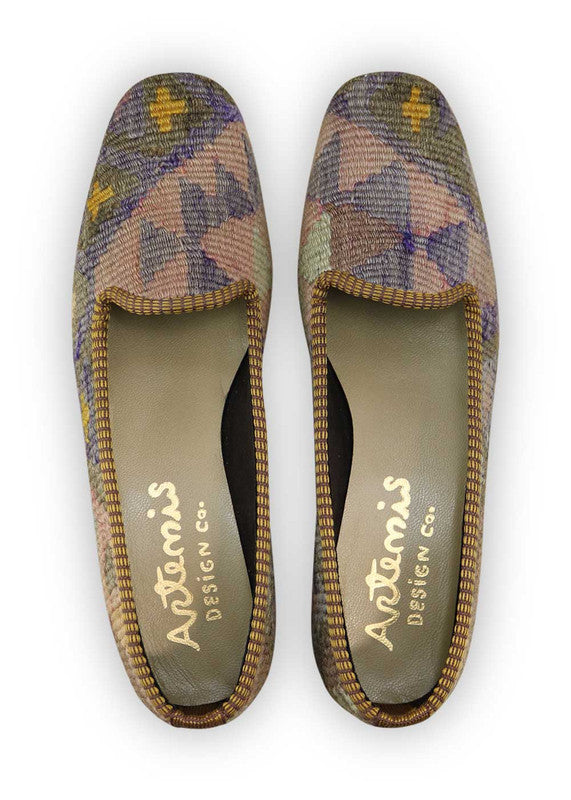 Artemis Design Co. Women's Loafers redefine elegance with a refined color palette of lilac, brown, grey, mustard, and pink. Meticulously crafted, these loafers seamlessly blend soft and earthy tones, creating a versatile and stylish footwear option. The dynamic interplay of colors, from the delicate lilac and pink to the rich browns, greys, and warm mustard, adds a touch of modern flair. (Front View)