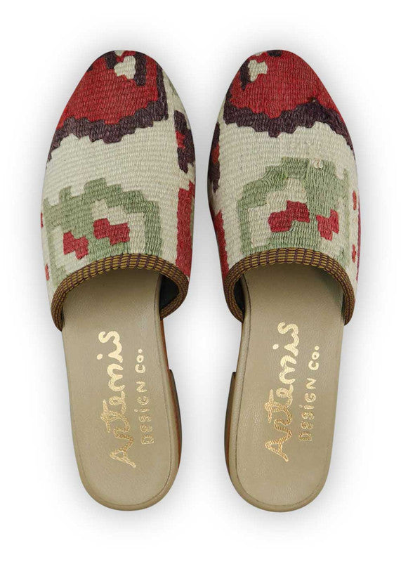 The Artemis Women's Slides exhibit a harmonious color combination of khaki, beige, red, purple, and green. These slides offer a balanced blend of earthy and bold tones, creating a versatile and stylish look. Whether you're enjoying a leisurely day or stepping out for a casual outing, these slides are the perfect choice. (Front View)