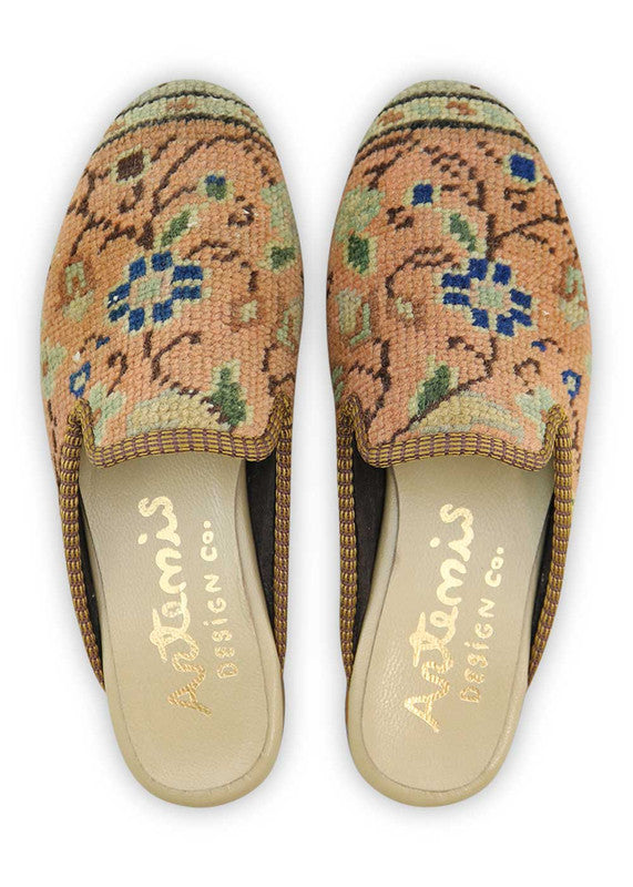 The Artemis Design& Co Women's Slippers are a fashionable and comfortable choice for women. They feature a stylish color combination of peach, green, blue, black, and white. Made with high-quality materials and attention to detail, these slippers offer durability and long-lasting comfort. (Front View)