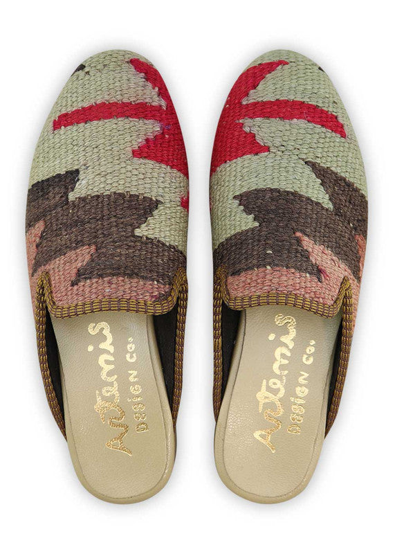 Introducing the Artemis Design& Co Women's Slippers, a perfect blend of style and comfort. These slippers feature a stunning color combination of grey, red, brown, peach, and blue, adding a vibrant pop of color to any outfit. Crafted with high-quality materials, these slippers are not only durable but also incredibly comfortable. (Front View)