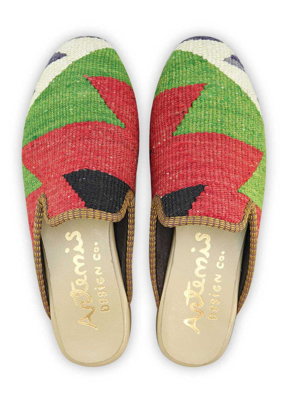 Artemis Design& Co Women's Slippers in the color combination of dark grey, white, green, red, black, and grey are a stylish and comfortable choice for any woman. These slippers are crafted with high-quality materials and attention to detail, ensuring both durability and comfort. (Front View)