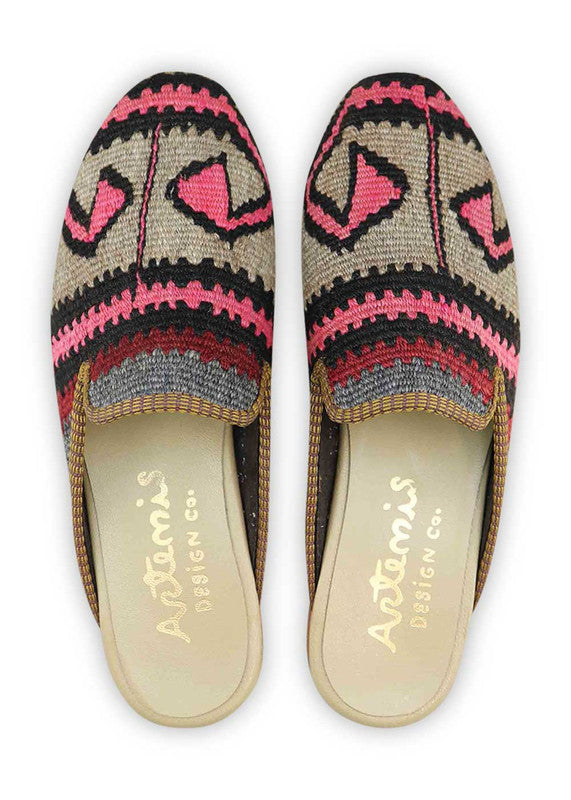 The Artemis Men's Slippers showcase a dynamic color combination of black, fuschia, grey, dark grey, orange, maroon, and brown. These slippers offer an energetic mix of bold and neutral tones, creating a stylish and eye-catching look. (Front View)