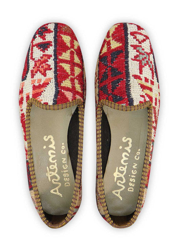 The Artemis Women's Loafer presents an eye-catching color combination of red, white, maroon, pink, khaki, teal grey, green, red orange, and brown. These loafers boast a playful mix of vibrant and earthy tones, creating a captivating and versatile look. (Front View)