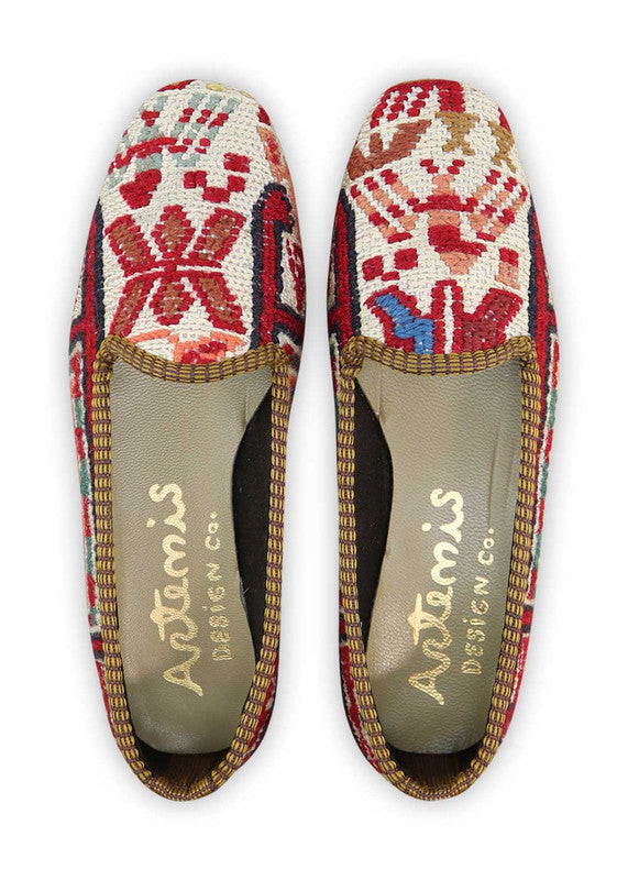 The Artemis Women's Loafer presents an eye-catching color combination of red, white, maroon, pink, khaki, teal grey, green, red orange, and brown. These loafers boast a playful mix of vibrant and earthy tones, creating a captivating and versatile look. (Front View)