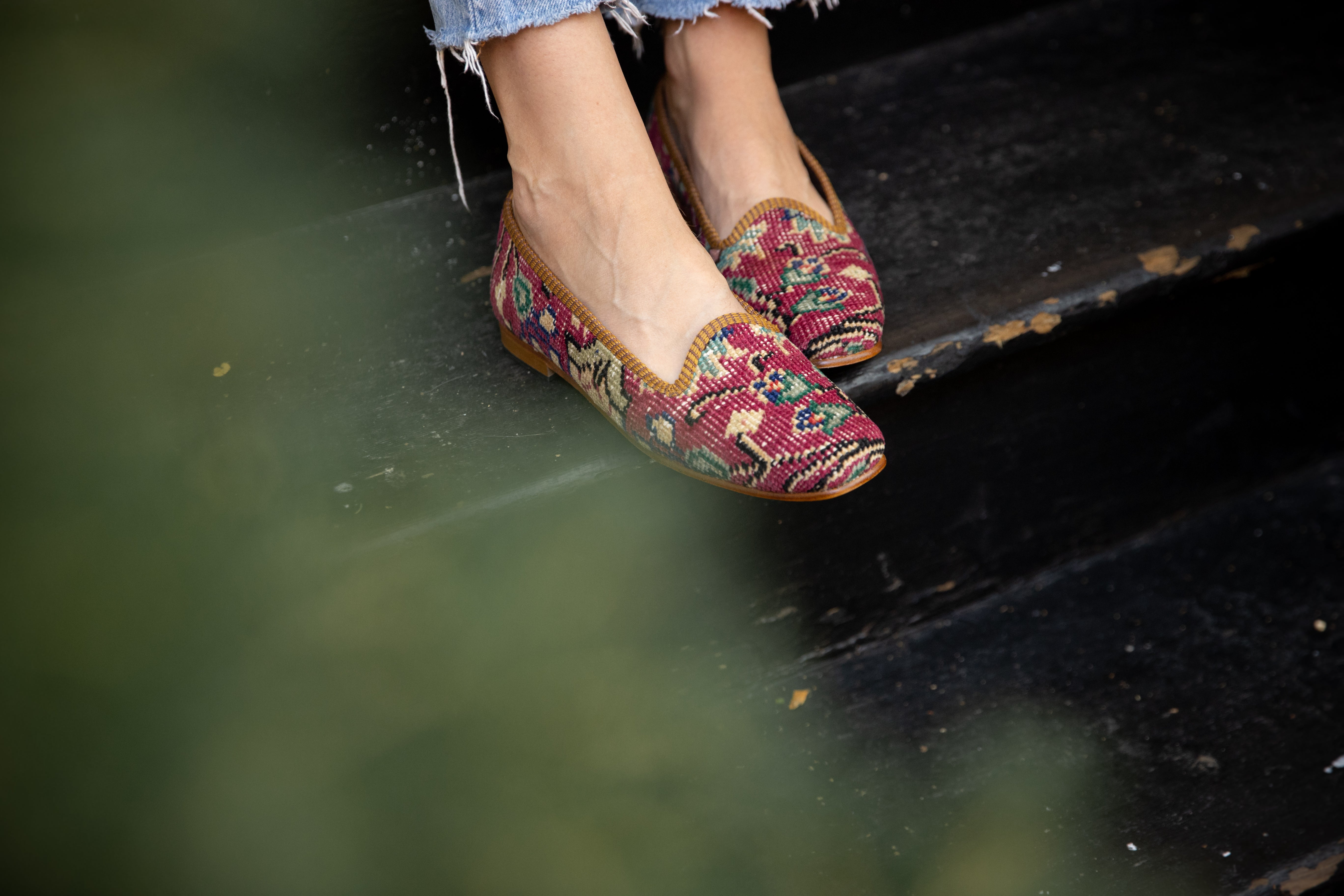 Omari Collins photo of women's carpet loafers on black stairs in beacon hill