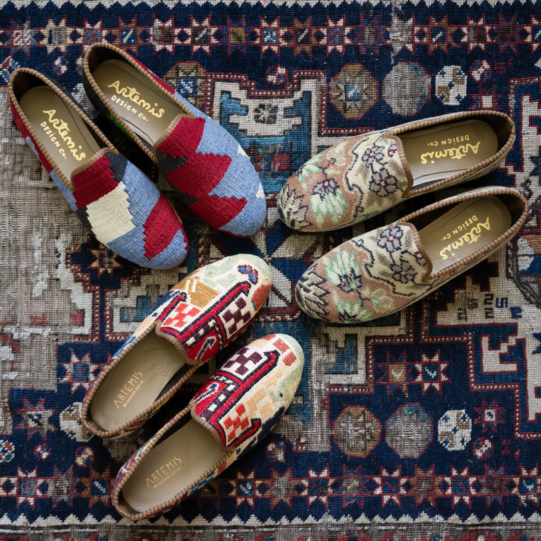 three pairs on Artemis men's kilim loafers on a blue oriental carpet