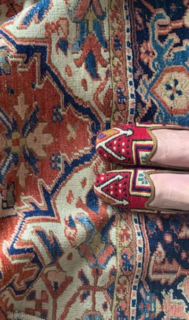 Kilim shoes on carpet