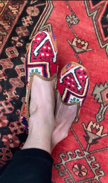 Kilim shoes on carpet