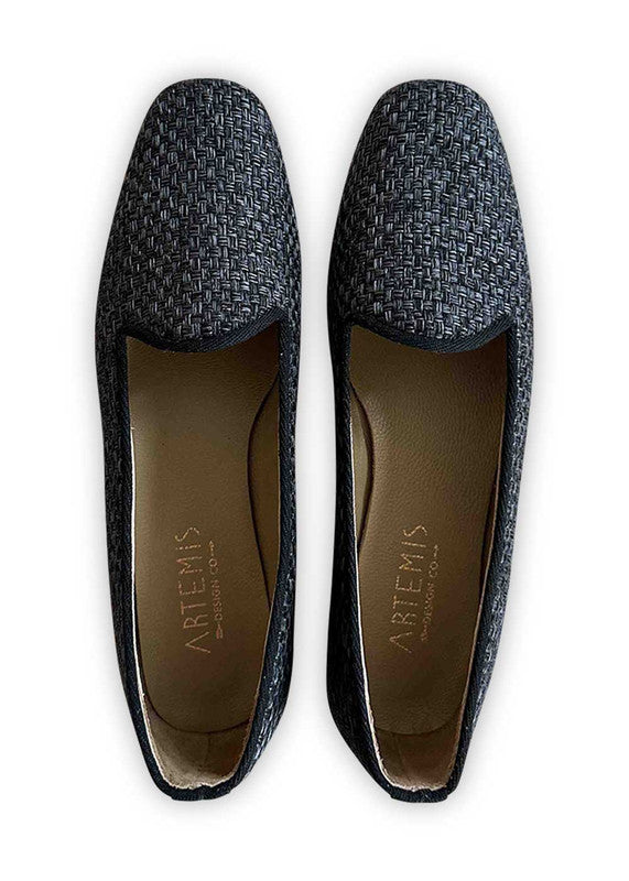 Step into sophistication with Artemis Design Co Women's Loafers in charcoal black. Crafted with precision and style, these loafers exude timeless elegance. The rich charcoal black hue adds a touch of refinement to any outfit, while the classic design ensures versatility for various occasions. (Front View)