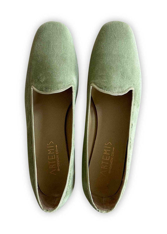 Artemis Design Co's Women's Loafers in green offer a fresh and vibrant take on classic footwear. Crafted with meticulous attention to detail, these loafers feature a sleek design with a comfortable fit. The rich green hue adds a pop of color to any outfit, making them perfect for both casual and formal occasions. (Front View)