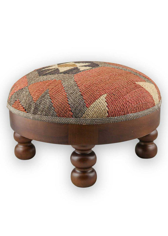 The Artemis Design & Co Footstool is a sophisticated and versatile addition to your living space, featuring a refined color combination of brown, dark grey, light brown, and black. Meticulously crafted, this footstool seamlessly blends warm and neutral tones, creating an elegant and timeless accent piece. (Side View)