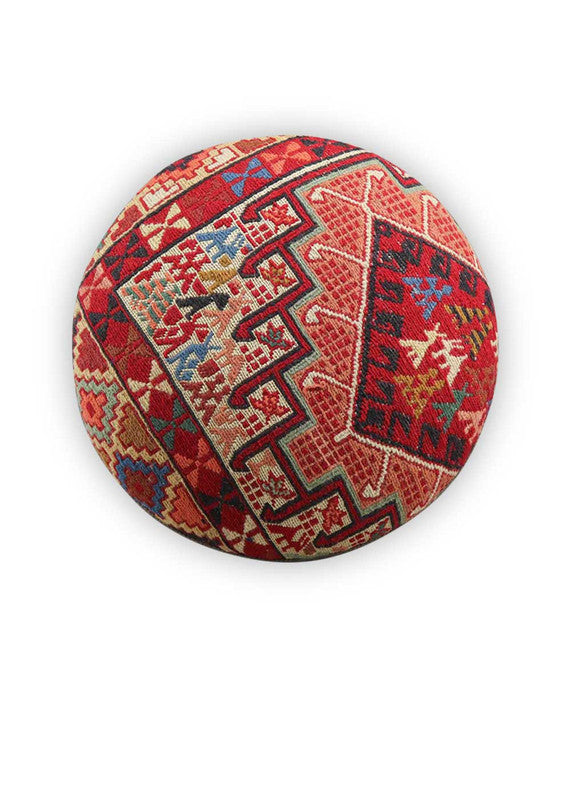 The Artemis Design & Co Foot Stool, featuring a dynamic and colorful combination of white, blue, red, black, green, orange, peach, brown, and teal, is a vibrant and eye-catching addition to your living space. This foot stool's diverse and bold color palette adds a playful and lively touch to your decor. (Front View)