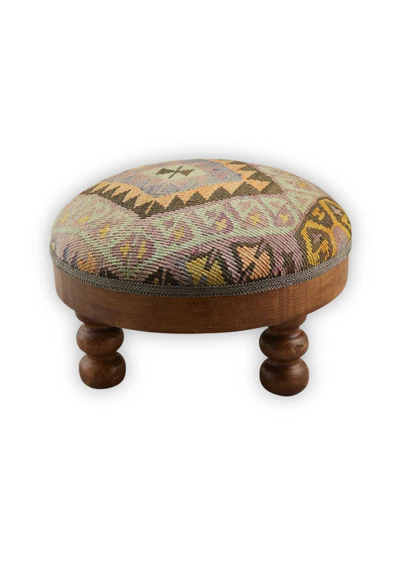 The Artemis Design & Co Foot Stool, featuring a chic and timeless color combination of mustard, brown, white, black, grey, and khaki, is a stylish and versatile addition to your home decor. This foot stool's sophisticated color palette adds a touch of elegance and warmth to any living space. 