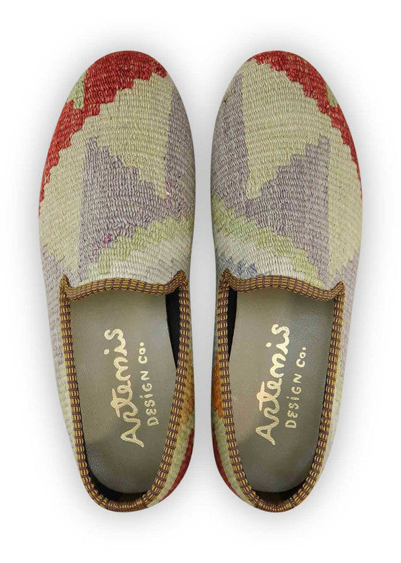 Artemis Design & Co Men's Loafers are a stylish and versatile footwear option for men. These loafers come in a trendy color combination of grey, white, mustard, red, and green, allowing you to effortlessly elevate your style. Meticulously crafted with premium materials, these loafers offer exceptional comfort and durability.  (Front View)