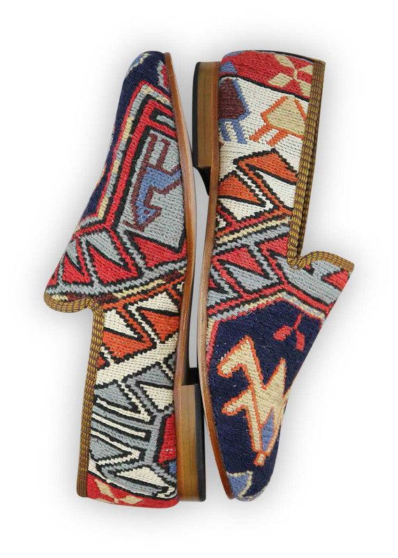 Artemis Design & Co Men's Loafers are a versatile and stylish choice for any occasion. Crafted with premium quality materials, these loafers offer both comfort and durability. The white, red, black, green, khaki, sky blue, pink, grey, and peach color combination adds a touch of sophistication to any outfit.  (Side View)