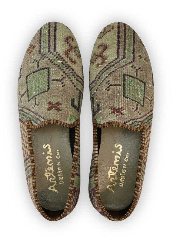 Artemis Design & Co Men's Loafers in khaki, brown, green, and white color combination are a stylish and versatile choice for men. These loafers boast a unique color palette that adds a sophisticated and eye-catching touch to any outfit. Crafted with premium materials, they offer exceptional comfort and durability. (Front View)