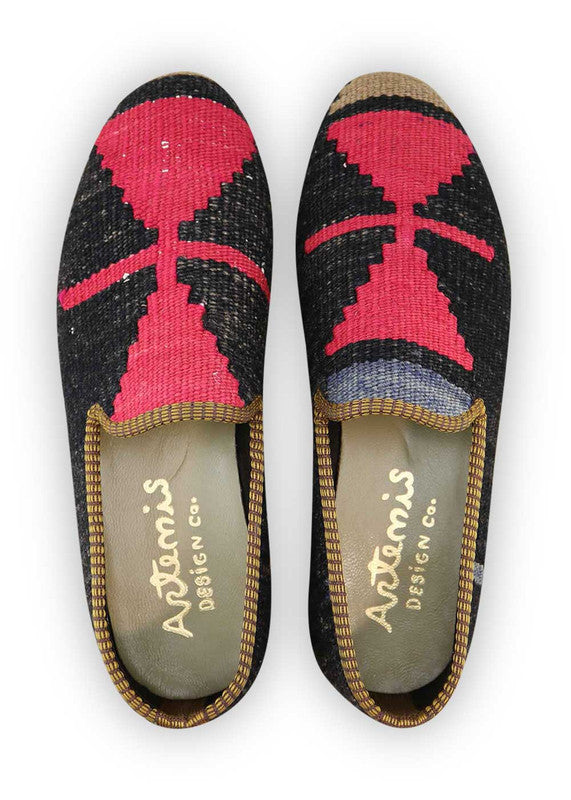 Artemis Design & Co Men's Loafers are the epitome of style and versatility. These loafers feature a stunning color combination of black, fuschia, khaki, and blue, creating a bold and eye-catching look. Crafted with premium materials, these loafers offer both comfort and durability, making them a perfect choice for any occasion.  (Front View)