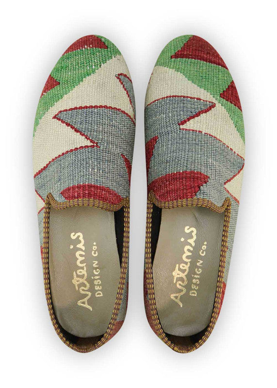 Artemis Design & Co Men's Loafers in green, white, and grey color combination are a stylish and versatile choice for any occasion. These loafers are crafted with premium materials, ensuring exceptional comfort and durability. The combination of green, white, and grey offers a unique and eye-catching look, allowing you to stand out from the crowd. (Front View)