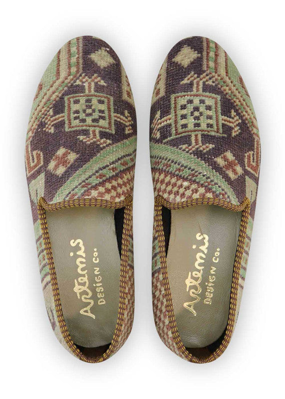 The Artemis Design & Co Men's Loafers in khaki, white, brown, and light green offer a unique and stylish color combination. Crafted with premium materials, these loafers provide exceptional comfort and durability. The khaki and white elements add a touch of elegance, while the brown and light green accents bring a fresh and trendy vibe to any outfit. (Front View)
