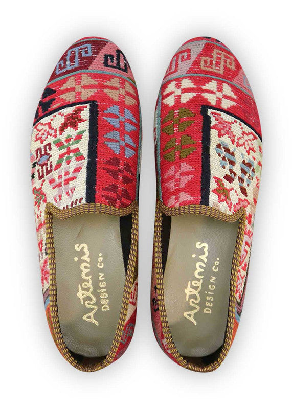 The Artemis Men's Loafers exude a captivating blend of colors, featuring white, red, blue, peach, green, and sky blue. These loafers seamlessly blend the classic appeal of white and blue with the boldness of red, complemented by the softness of peach and green, set against the calming backdrop of sky blue. (Front View)