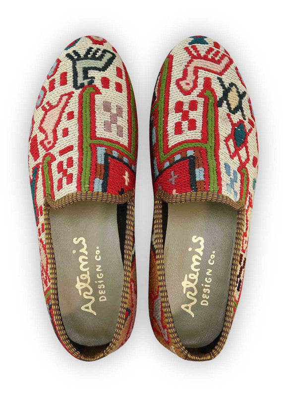The Artemis Men's Loafers exude a captivating blend of colors, featuring white, red, blue, peach, green, and sky blue. These loafers seamlessly blend the classic appeal of white and blue with the boldness of red, complemented by the softness of peach and green, set against the calming backdrop of sky blue. (Front View)