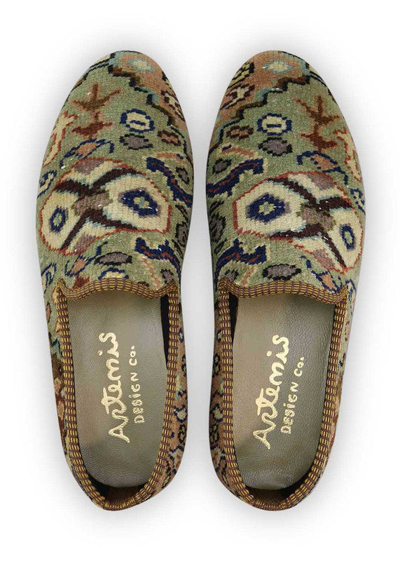 The Artemis Men's Loafers boast a refined blend of colors, featuring khaki, red, grey, black, and white. These loafers seamlessly merge the neutral charm of khaki and grey with the boldness of red and black, complemented by the classic appeal of white. The result is a harmonious and versatile color combination that exudes both confidence and modern style.  (Front View)