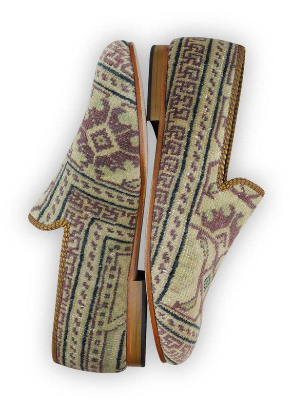 The Artemis Men's Loafers radiate versatile charm with a captivating color palette of khaki, brown, red, white, blue, and green. These loafers seamlessly merge the natural tones of khaki and brown with the boldness of red and blue, complemented by the classic appeal of white and the freshness of green. (Side View)