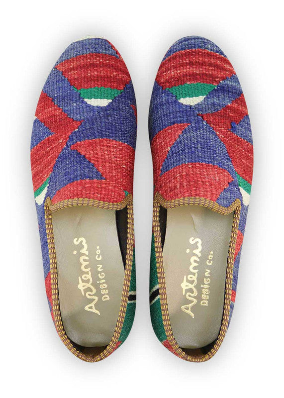 The Artemis Men's Loafers showcase a sleek blend of colors, featuring red, blue, green, white, and black. These loafers effortlessly blend the vibrant energy of red, blue, and green with the classic appeal of white and black. The result is a balanced and versatile color combination that exudes both confidence and modern style. (Front View)