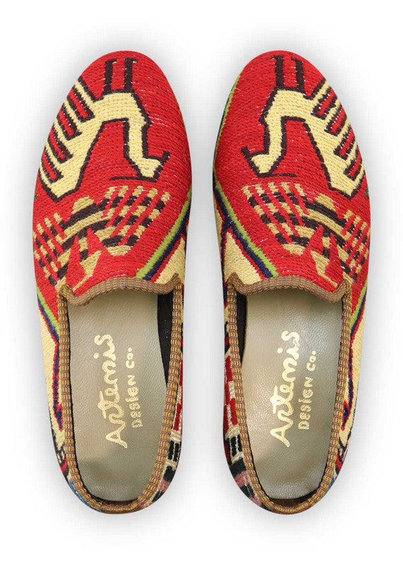 Artemis Design Co. Men's Loafers epitomize contemporary elegance, boasting a sleek color palette of white, red, blue, grey, peach, and brown. Meticulously crafted, these loafers seamlessly marry style with versatility. Whether complementing casual or formal attire, they radiate sophistication and flair with every step. (Front View)