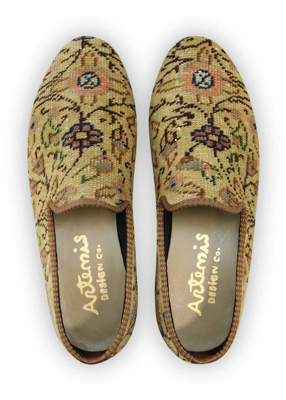 Artemis Design Co. Men's Loafers harmonize classic sophistication with contemporary style, featuring a refined palette of khaki, brown, peach, blue, red, and black. Crafted with meticulous attention to detail, these loafers seamlessly blend versatility with elegance. Whether for formal occasions or everyday wear, they exude confidence and refinement. (Front View)