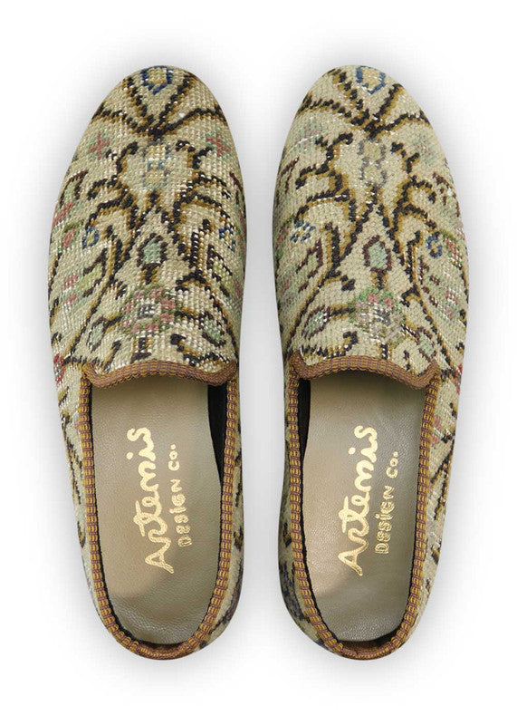 Artemis Design Co. Men's Loafers harmonize classic sophistication with contemporary style, featuring a refined palette of khaki, brown, peach, blue, red, and black. Crafted with meticulous attention to detail, these loafers seamlessly blend versatility with elegance. Whether for formal occasions or everyday wear, they exude confidence and refinement. (Front View)