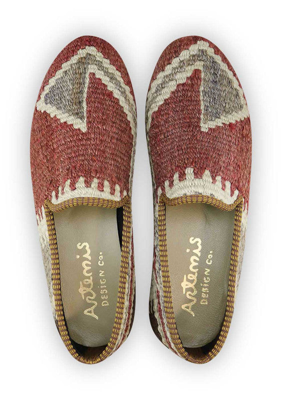 The Artemis Men's Loafers showcase a timeless color combination of maroon, white, grey, and brown. These loafers elegantly blend the rich tones of maroon and brown with the classic appeal of white and the neutrality of grey. The result is a balanced and versatile color palette that exudes both sophistication and style. (Front View)
