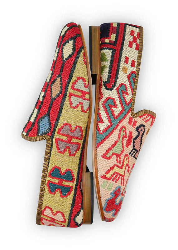 The Artemis Men's Loafers bring together a kaleidoscope of colors, including red, sky blue, beige, white, khaki, grey, green, and peach. These loafers skillfully blend the boldness of red and sky blue with the neutrality of beige, white, khaki, and grey, accented by refreshing hints of green and delicate peach. (Side View)