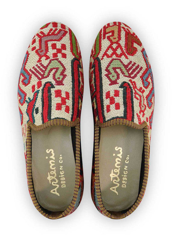 The Artemis Men's Loafers embody a vibrant symphony of colors, featuring red, white, green, orange, navy blue, yellow, and sky blue. These loafers artfully combine the classic appeal of white with energetic bursts of red, green, orange, and yellow, balanced by the calming tones of navy blue and sky blue. (Front View)