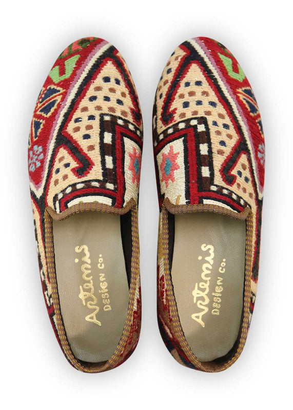 Artemis Design Co. Men's Loafers offer a bold and eclectic color palette, featuring hues of red, pink, blue, brown, orange, sky blue, yellow, and green. Crafted with meticulous attention to detail, these loafers seamlessly blend vibrant colors with timeless style. Perfect for adding a pop of personality to any ensemble, they are suitable for both casual and semi-formal occasions. (Front View)