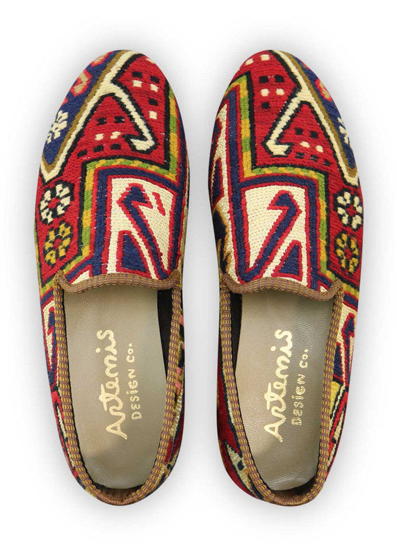 Artemis Design Co. Men's Loafers redefine elegance with a captivating color palette featuring shades of peach, red, blue, brown, yellow-green, and white. Meticulously crafted, these loafers seamlessly blend classic sophistication with modern charm. The harmonious combination of colors adds a touch of vibrancy and personality to any ensemble, making them a versatile choice for various occasions. (Front View)
