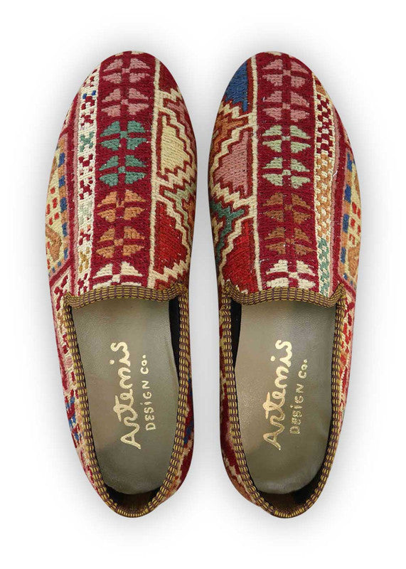 The Artemis Men's Loafers offer a stylish blend of maroon, light green, khaki, blue, and white. These uniquely designed loafers combine rich maroon and khaki tones with accents of light green and blue, all set against a crisp white backdrop.  (Front View)