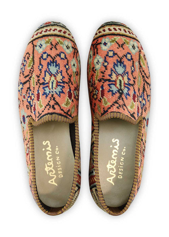 Artemis Design & Co Men's Loafers are a fresh and fashionable choice, adorned with a delightful color combination of peach, sky blue, white, green, red, and maroon. These loafers are meticulously crafted, often featuring handwoven kilim textiles in this harmonious and captivating palette.  (Front View)