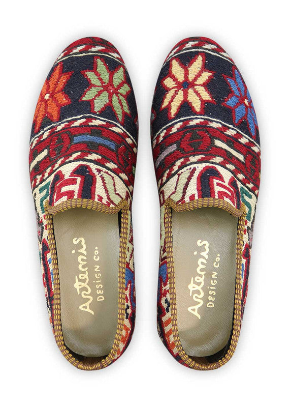 Artemis Design & Co Men's Loafers are a classic and nautical-inspired footwear option with a color combination of navy blue, white, red, cream, and sky blue. These loafers are meticulously crafted, often featuring handwoven kilim textiles in these maritime-inspired shades.  (Front View)