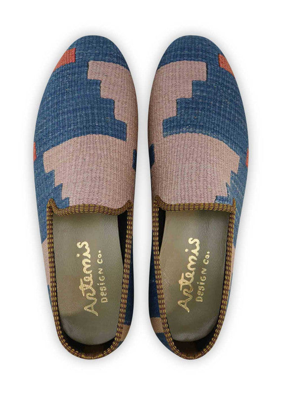 The Artemis Men's Loafers showcase a sophisticated blend of blue, beige, orange, and khaki. These loafers seamlessly intertwine calming blue and neutral beige tones, accented by vibrant pops of orange and understated khaki. (Front View)