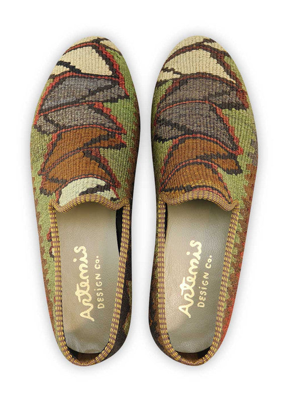 Artemis Design & Co Men's Loafers showcase a rich color palette of green, red, brown, black, rust, and cream, creating a harmonious blend of earthy and bold tones. Meticulously crafted, these loafers seamlessly merge warm and vibrant colors, offering a versatile and stylish footwear option. (Front View)