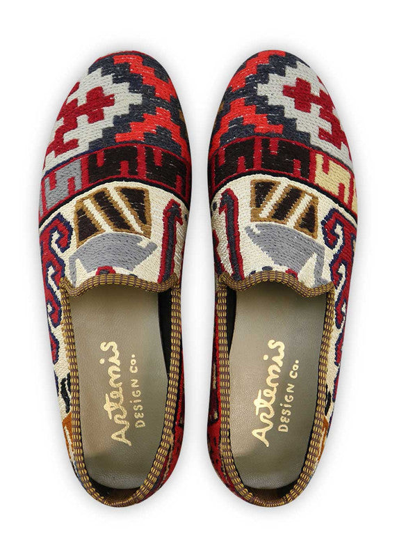 Artemis Design & Co Men's Loafers epitomize casual sophistication with a classic color palette of white, red, blue, green, cream, and black. Meticulously crafted, these loafers seamlessly blend crisp and vibrant tones, creating a versatile and stylish footwear option. (Front View)