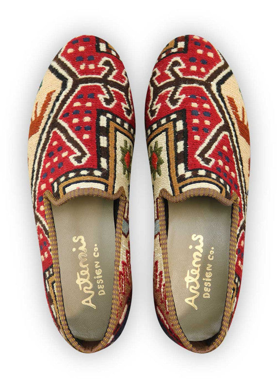 Artemis Design Co. Men's Loafers redefine classic elegance with a captivating color scheme featuring white, red, khaki, green, orange, brown, rust, and black. Crafted with meticulous attention to detail, these loafers seamlessly blend timeless style with contemporary flair. The combination of rich hues creates a striking visual appeal, making them a standout choice for any occasion. (Front View)