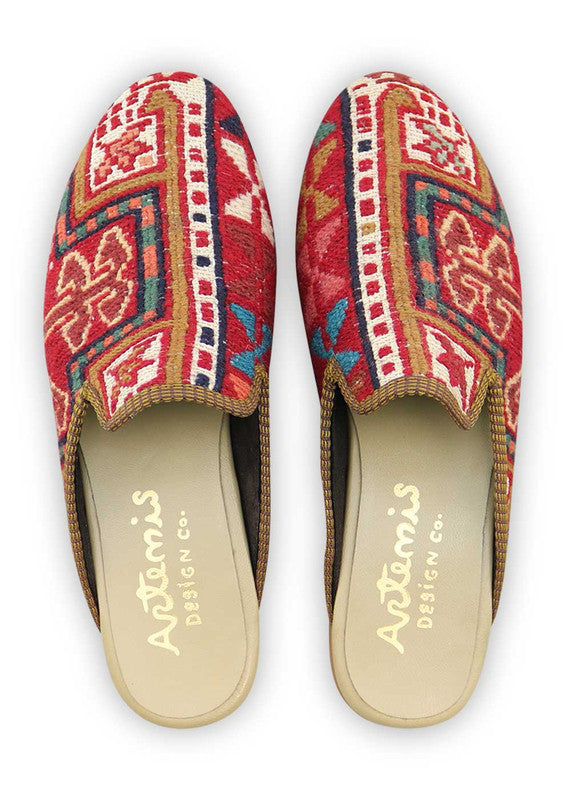 Artemis Design & Co introduces Men's Slippers that embody a vibrant spectrum of colors, including red, white, green, peach, blue, orange, brown, and teal. Elevate your comfort with these stylish and diverse slippers, carefully crafted to bring a touch of flair to your loungewear. (Front View)