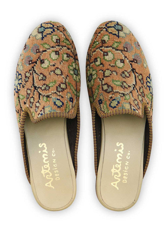 Artemis Design & Co introduces Men's Slippers in a refreshing color palette, featuring peach, black, green, khaki, and sky blue. Immerse yourself in comfort and style with these meticulously crafted slippers. The combination of earthy tones and cool hues creates a harmonious and modern aesthetic, making these slippers a versatile choice for the contemporary man. (Front View)